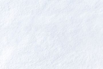 Snow texture. High angle view. White abstract background. Fresh fine snow, like dust.