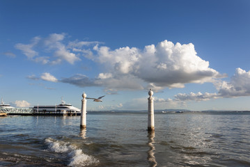 View of the Cais das Colunas and the Tagus River (Rio Tejo) in the city of Lisbon, Portugal; Concept for visit Lisbon