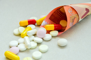 tablets are scattered on the table, dosage for the patient