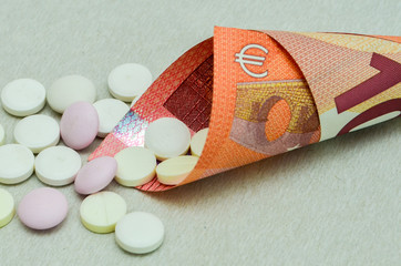 tablets are scattered on the table, dosage for the patient