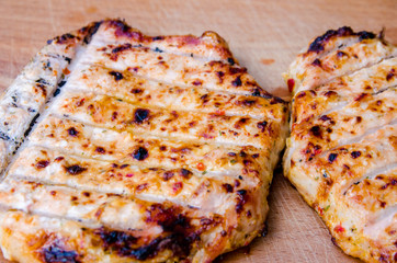 tasty, juicy meat is cooked on the grill, grilling meat