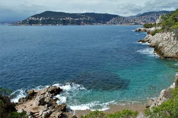 Hiking the beautiful trail along the sea in St Jean Cap Ferrat, French Riviera