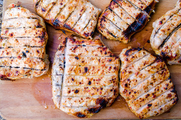 tasty, juicy meat is cooked on the grill, grilling meat