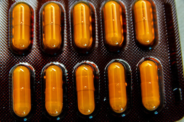 tablets are scattered on the table, dosage for the patient