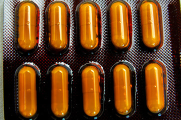 tablets are scattered on the table, dosage for the patient