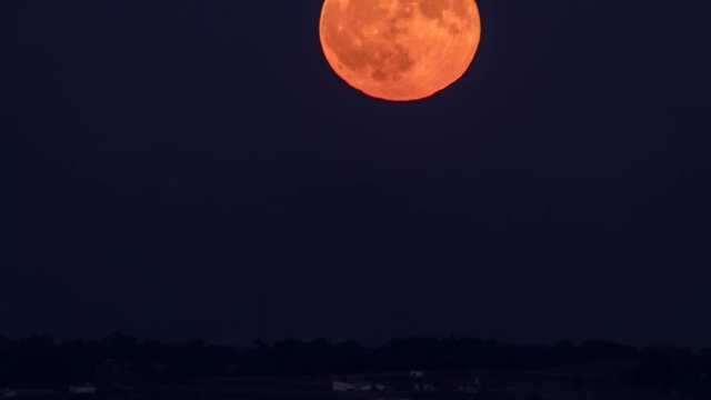  Full moon rising from horizon timelapse
