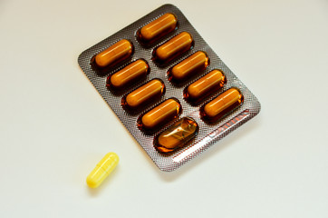 tablets are scattered on the table, dosage for the patient