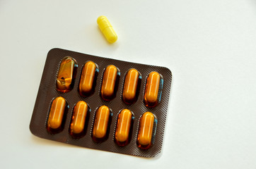 tablets are scattered on the table, dosage for the patient