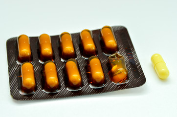 tablets are scattered on the table, dosage for the patient