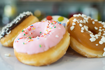 a close up of a selection of sweet ice ring doughnuts