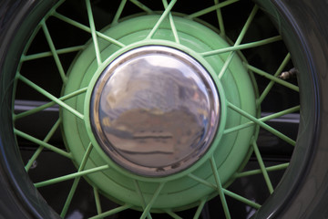 Vintage car wheel with spokes