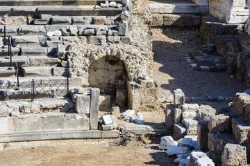 ruins of the stage of the amphitheater with the arch. Side, Turkey
