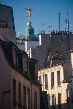The Colonne de Juillet (the July column) rises above the buildings of the 11th arrodissemetn, PLace de la Bastille, Paris, France