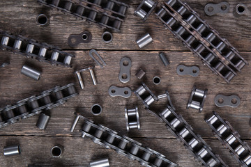 Industrial driving roller chain. Part of the chain drive of machine-building mechanism.