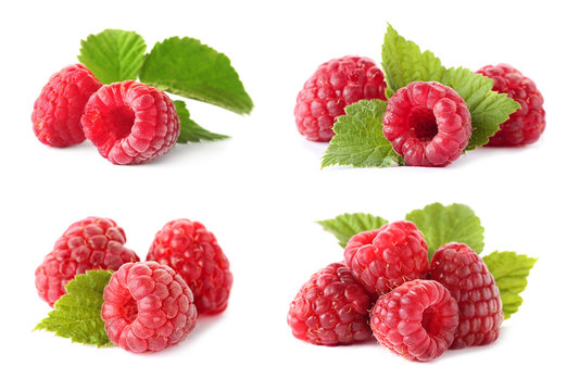 Set with ripe raspberries on white background