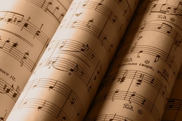 Rolled Up Music Notes Pages Close-Up