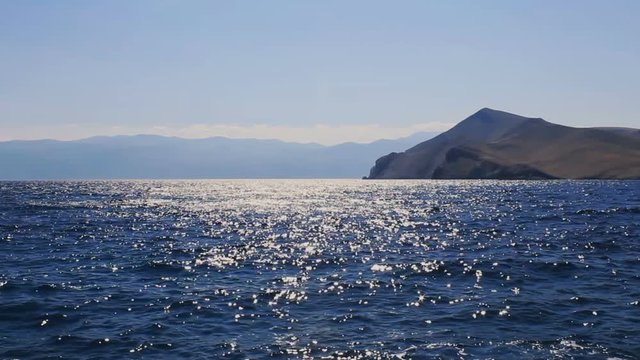 Waves in sea with island