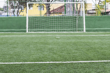 Field football with artificial grass, view of the beam where goals are scored