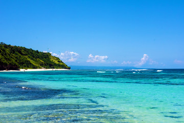 summer at beach with coral and blue sky