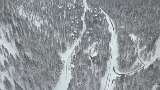 Aerial, snowy winter road in Lake Tahoe