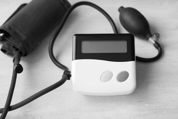 Medical tonometer on a gray background.