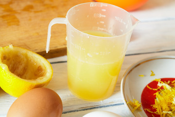 extruding juice from a lemon.