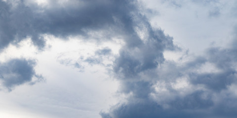 Grey clouds at the sky in evening
