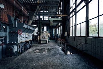 Naklejka na ściany i meble old lost abandonend industrial factory building powerhouse