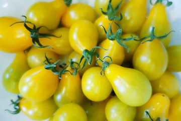 Yellow and orange cherry tomatoes