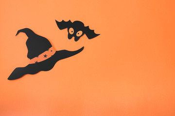 Halloween black paper decorations with orange background