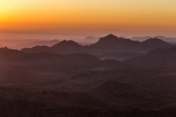 Fototapeta na wymiar Mountains before during sunrise in the Egypt. Sinai Peninsula, the mountain of Moses
