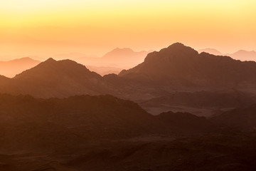 Fototapeta na wymiar sunset silhouette Sinai Mountain chain in Egypt