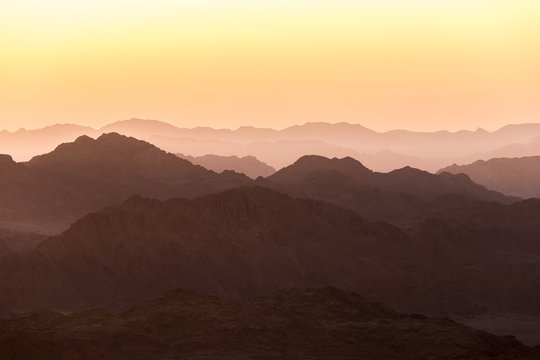 Rising sun and Sinai mountains dramatic landscape view (Mount Horeb, Gabal Musa, Moses Mount). © matiplanas
