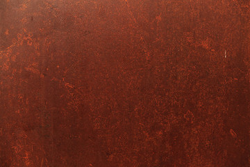 old detailed aged vintage rusty seamless red brown textured metal sheet exterior fence used in construction industry as a house building material. Good for background, backdrop, wallpaper
