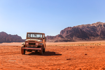 Old car in the Wadi Rum Desert, Jordan