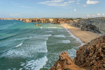 Long waves at the west shore and beach of Cape Saint Vincent as seen from the lighthouse