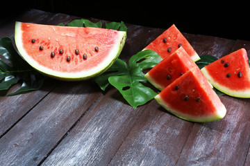 watermelon on table. juicy summer fruit in slices.