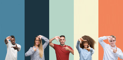 Group of people over vintage colors background smiling making frame with hands and fingers with happy face. Creativity and photography concept.