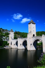 Fototapeta na wymiar The medieval Pont Valentre crossing the Lot River in Cahors, France