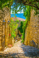Narrow street in Lacoste village in France