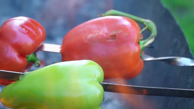 cooking pepper on fire