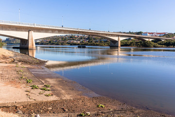Fototapeta na wymiar River Lagoon Bridge Crossing Upstream landscape
