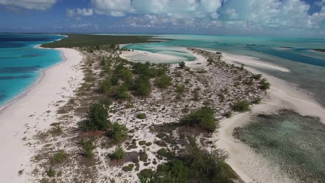 Panning aerial, tropical beach in Turks and Caicos