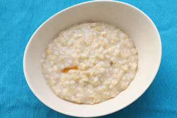 Plate of oatmeal for breakfast on the table