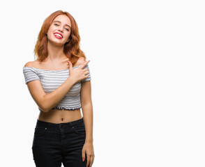 Fototapeta premium Young beautiful woman over isolated background cheerful with a smile of face pointing with hand and finger up to the side with happy and natural expression on face looking at the camera.