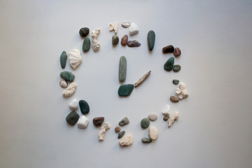 Sea stones clock face abstract composition
