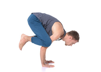 Young man practicing yoga. Yoga. Yoga Instructor