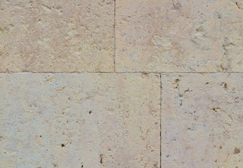 Image of light stone wall of Sandstone as background.