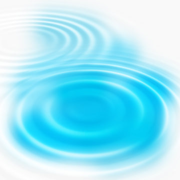 Abstract blue concentric ripples