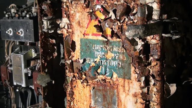 Rusted equipment of former Soviet military undergroundbase ghost town of Gudym. Abandoned factory on Chukotka of far north of Russia. Unique place for stalkers.